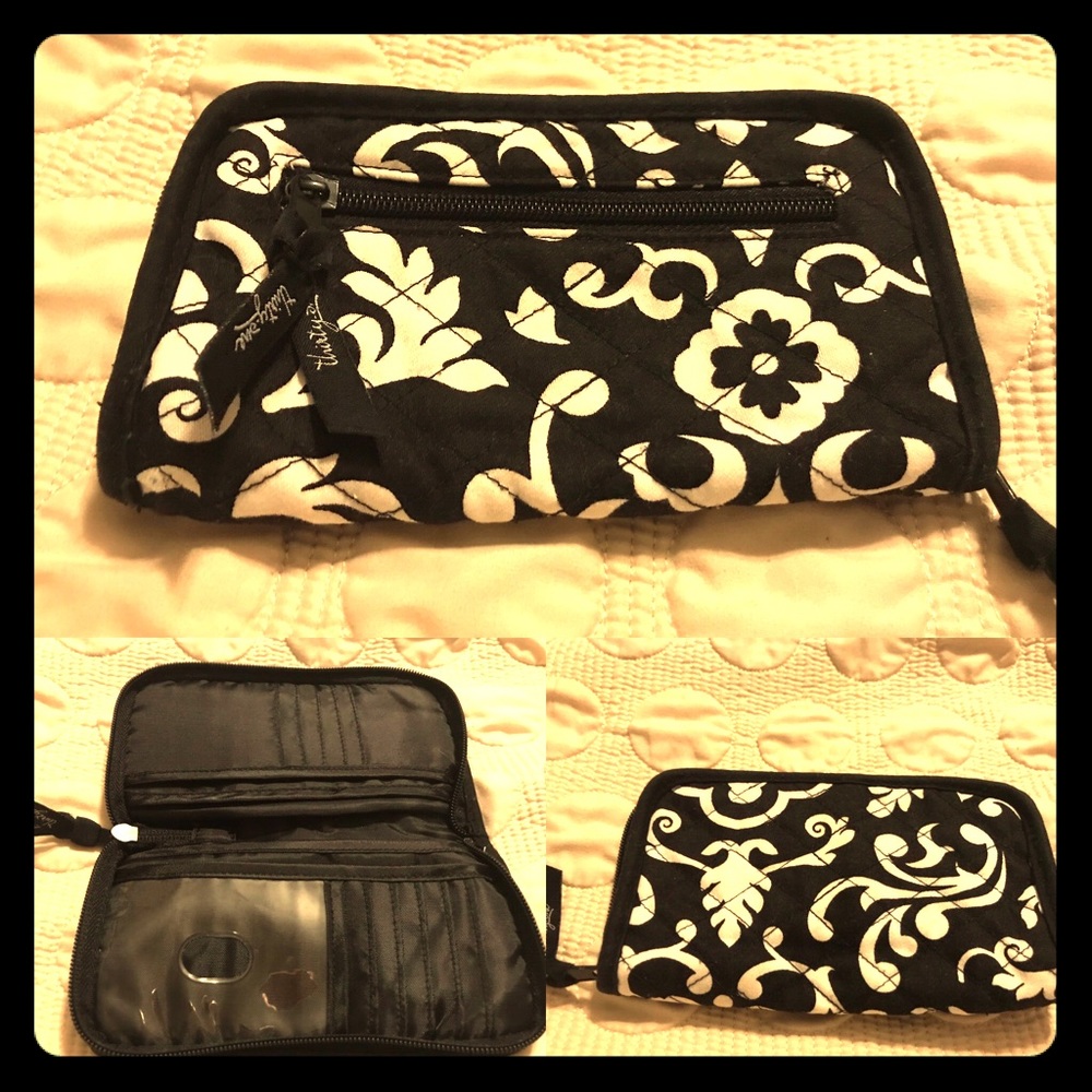 Great Condition. Black and White wallet.